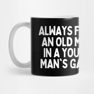 Never underestimate an old man in a young man's game Mug